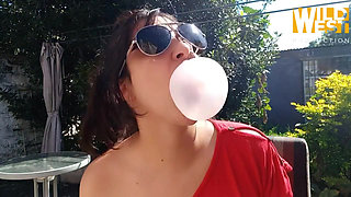 Eat Chewing Gum Outside While Showing off Your Boobs.