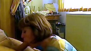 Mom gives young neighbor a blowjob - amateur homemade video