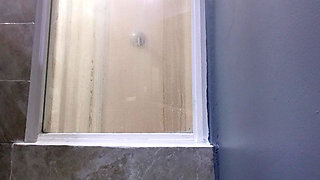 I take a nice bath at the hotel while I wait to relax.