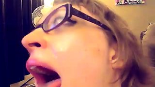 Busting a big nut on the face of a slutty girl in glasses
