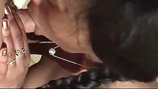 Pornstar Ana Loxx giving interracial blowjob