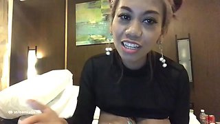 Busty Filipina Coco sucks big brown nipples on cam