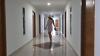 Hot MILF Without Bra and Panties in the Hotel Corridor and Pisses on the Balcony