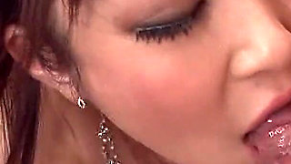 Horny Japanese babe blows two guys and gets her hairy pussy rammed