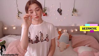 Petite plays on bed
