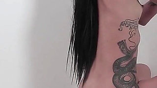 Skinny Brunette in Gloryhole Action!