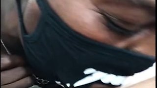 Black girl with mask blowjob in the car