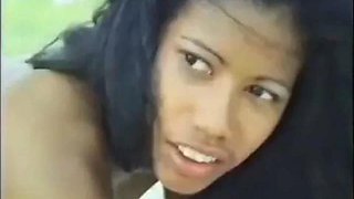 Hot mulatto with a big tail moaning and enjoying giving her pussy and spitting on the beach: Porn