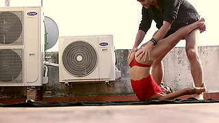 Woman in Red at the Rooftop