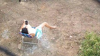 My cute wifey all naked and chilling in the front yard