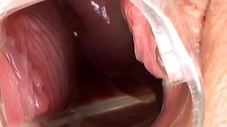Deepthroating teen gapes her pussyhole with speculum
