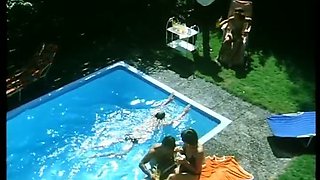 Short haired lean busty babe by the pool sucking dick