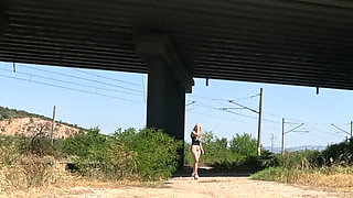 Slave Tih Shows Her Pussy and Tits Under the Bridge
