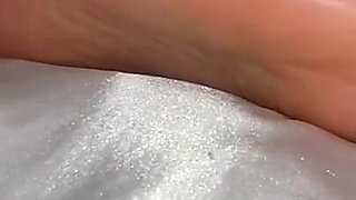 Ebony Girl Under Her Covers in Bed Show off Feet