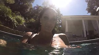 Curvy Alison swims and masturbates in the pool