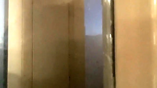 Standing on the Bare Chair in Front of the Window