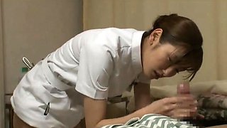 Horny Japanese nurse stuffs her hungry cunt with hard meat