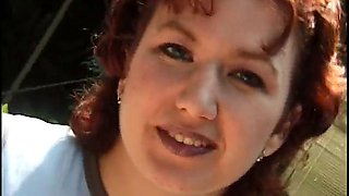 Redhead MILF with small tits rides a hard cock by the pool