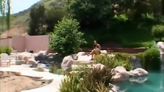 Petite amateur drilled by a big cock outdoors by the pool