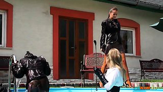 Domina Makes Two Babes Wrestle in Pool