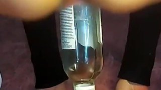 Sister Jumping on a Giant Bottle