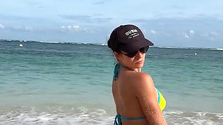 Teasing on the Beach in Micro Bikini on the Sand