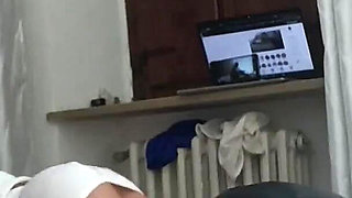 Laura wearing stockings and high heels is bound on the bed, her mouth and pussy fucked