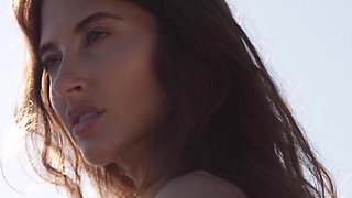 Russian babe relaxing naked at the beach