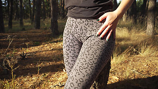 Girl Teases Her Big Cameltoe in Leopard Leggings Outdoors