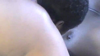 African Mama Multitasks on a Sunday Morning