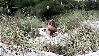 Hot Brunette Naked in the Dunes