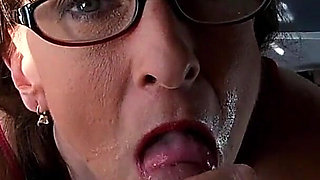 Sexy Granny Wearing Glasses Sucks and Drains a Fat Cock