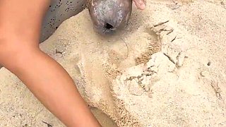 Masturbating on the Beach