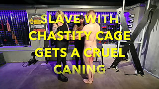 Slave in Chastity Cage Gets a Cruel Caning
