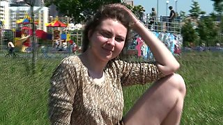 Cute plump teen Masha flashes her muff sitting on the bench in suburb