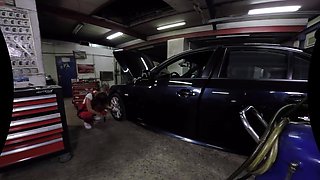 Cute Female Mechanic Plays Solo in the Car Service