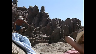 A Wild Girl Gets Fucked on the Beach Until He Cums on Her Face