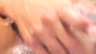 Asmodia's Shower Dildo Orgasm! Enjoy How This Sexy Brunette Babe Masturbates to Orgasm in the Shower with a Transparent Dildo.