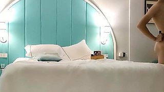 Cute amateur asian web cam girl playing with her toy