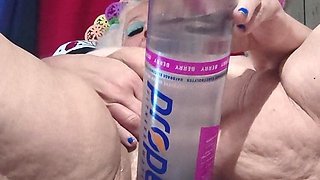 Big Bottle Plugged Clit Cunt