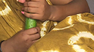 Hijab Fucking Herself Using Big Cucumber with Condom to Slide Into the Pussy