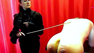 BOOT WORSHIP & CANING Spanking
