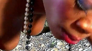 Ebony MILF Naomi fucks young vacation flirt on the beach