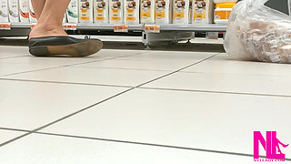 Footplay and Dipping in Black Flats at a Conad Store