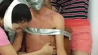 Chair Bound and Tickled by Three Microfoamly Tape Gagged Girls!