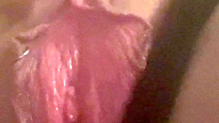 MILF Stimulating Clit with New Toy