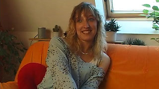 Lovely blonde with pierced tits rubs her pussy at the casting
