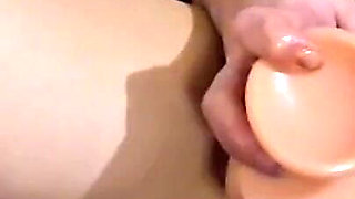 Teen Plays with First Dildo