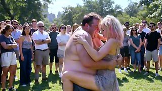 Public slut spreads joy and moans as crowd cheers kinky fun