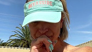 Blonde is flashing her big boobs in the outdoors